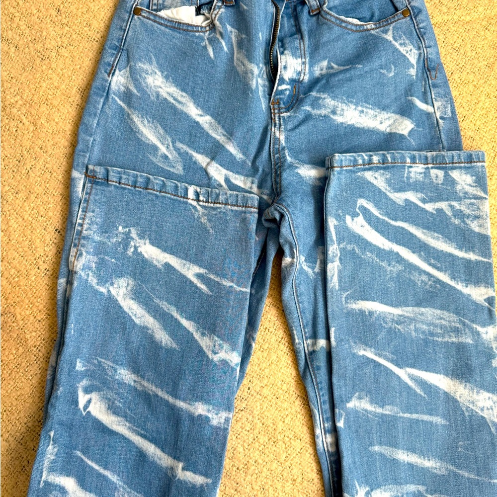 Beautiful sky blue pants with white spot on it. Split on both side of the pants